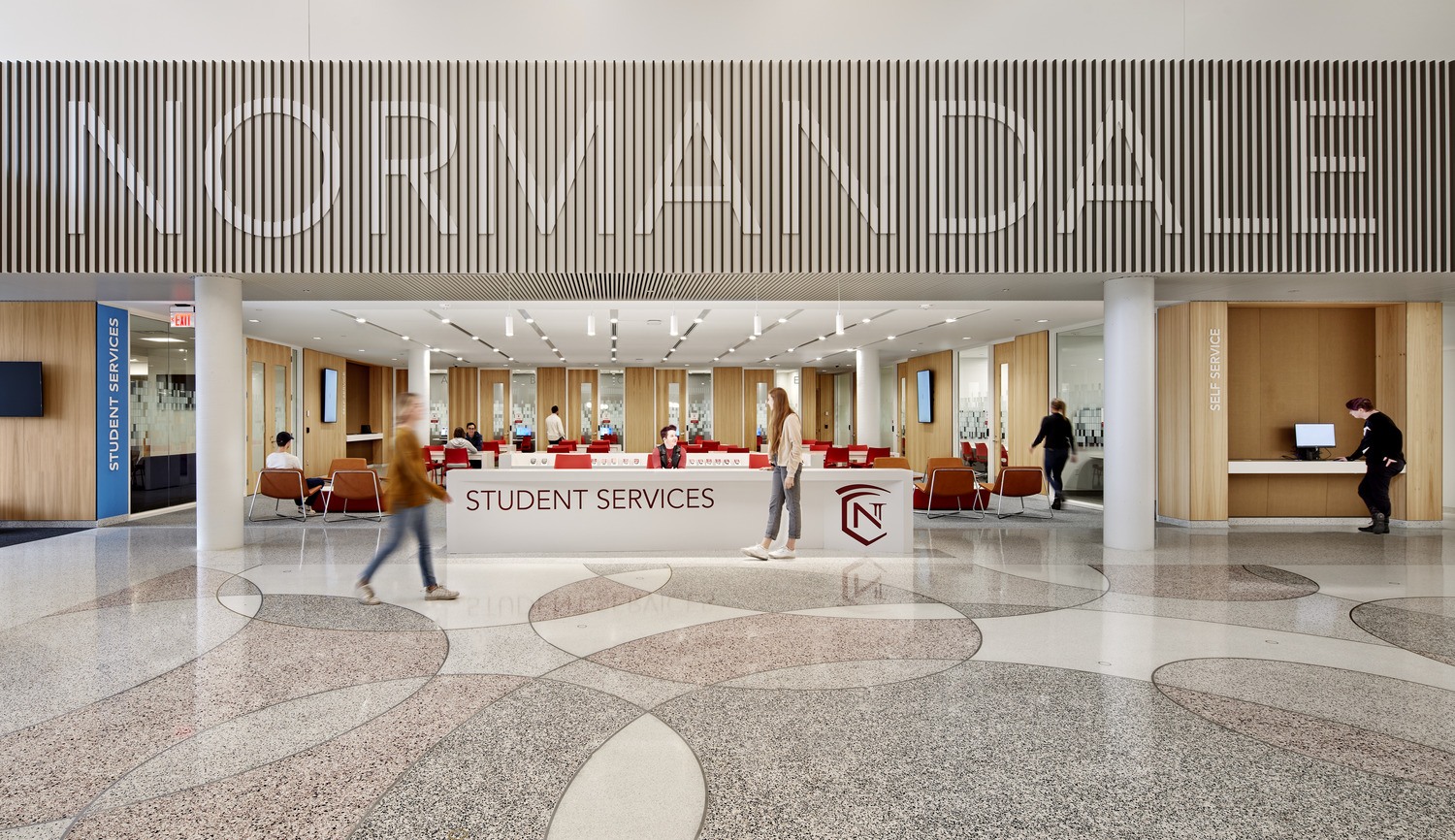 Modern corporate logo signage on building facade